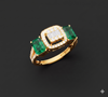TRI STONE EMERALD CUT DIAMOND RING