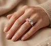 TRI STONE EMERALD CUT DIAMOND RING