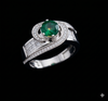 ELEGANT SWIRL EMERALD SOLITAIRE RING