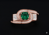 ELEGANT SWIRL EMERALD SOLITAIRE RING